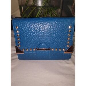 LP Blue Pebbled Crossbody Clutch Handbag featuring a vibrant blue faux-leather